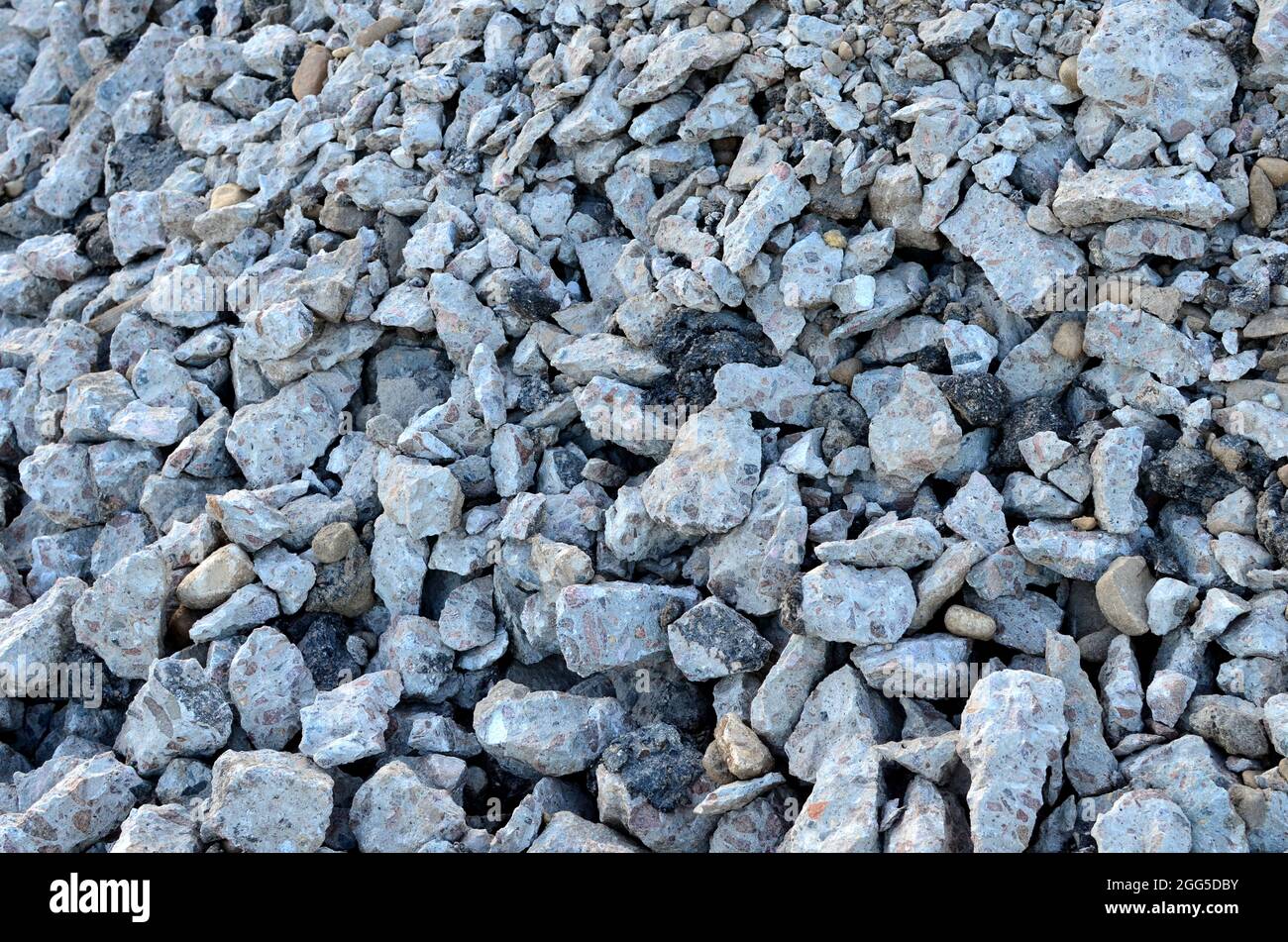 Concrete after crushing for recycling. Reuse crushed concrete rubble