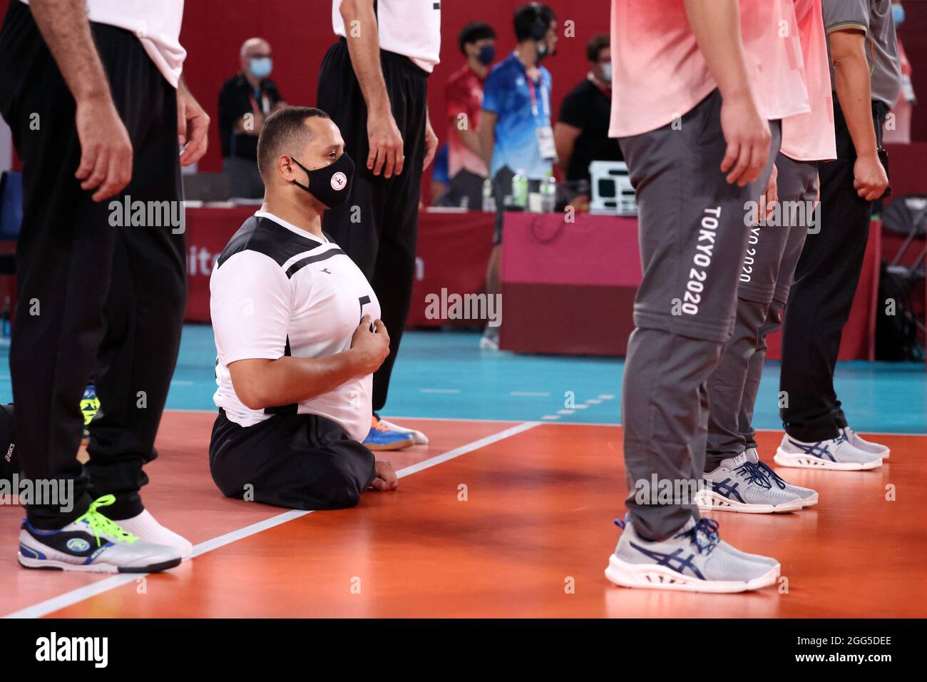 Tokyo 2020 Paralympic Games - Sitting Volleyball - Men's Preliminaries Pool  A - Makuhari Messe Hall A, Chiba, Japan - August 29, 2021. Mohamed Zeid of  Egypt observes the national anthem REUTERS/Ivan Alvarado Stock Photo - Alamy