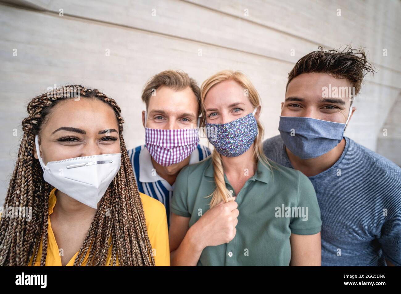 Diverse group of students wearing mask hi-res stock photography