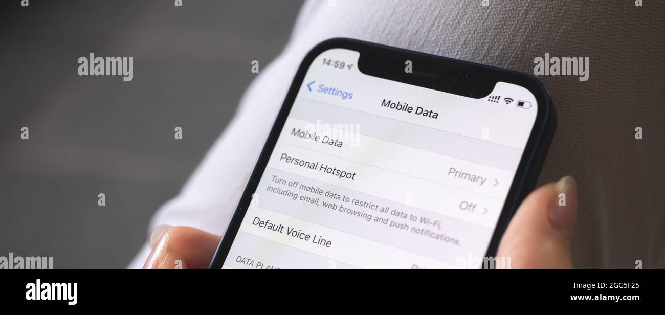 Mobile data setting screen on mobile phone close-up. Cellular data on smartphone. Banner Stock Photo