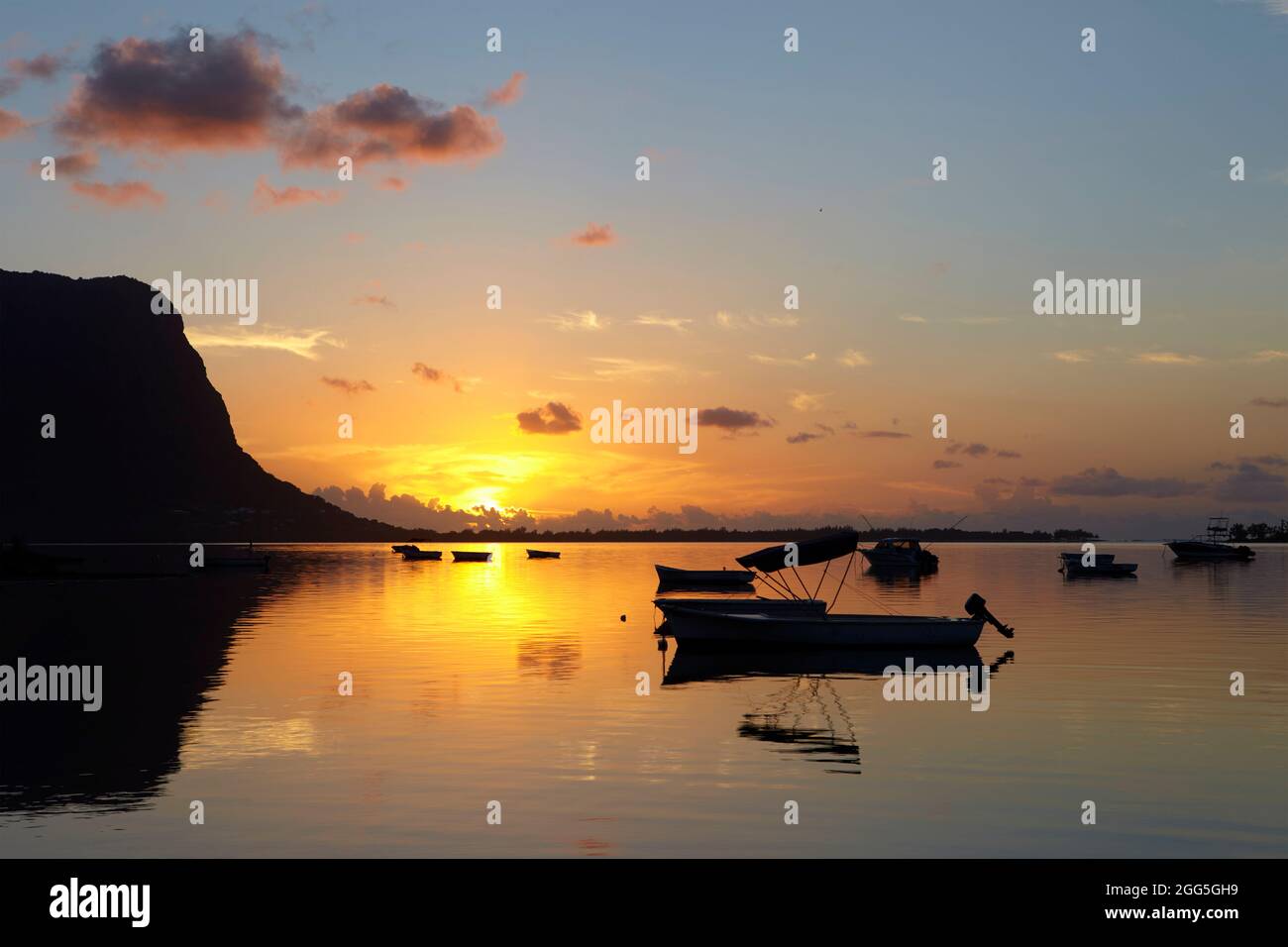 Little harbour at sunset in Le Morne Brabant, Mauritius Stock Photo