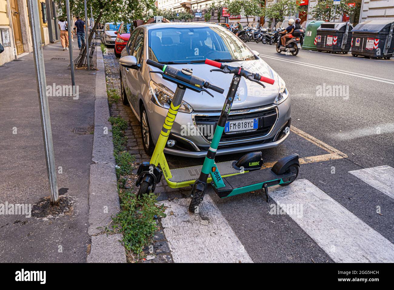 ROME ITALY UK. 29 August 2021. Electric scooters are wrongly parked on