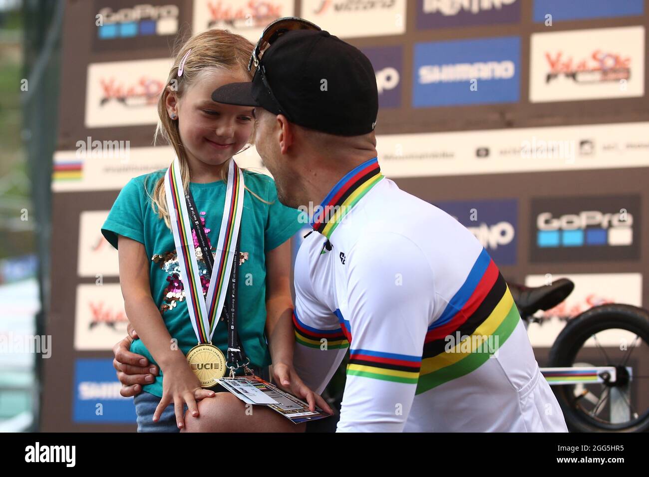 UCI 2021 Mountain Bike Cross Country World  Championships   in Commezzadura on August 28, 2021. Men Olympic,  Nino Schurter (SUi) and her daughter  (Photo by Pierre Teyssot/ESPA-Images) Stock Photo