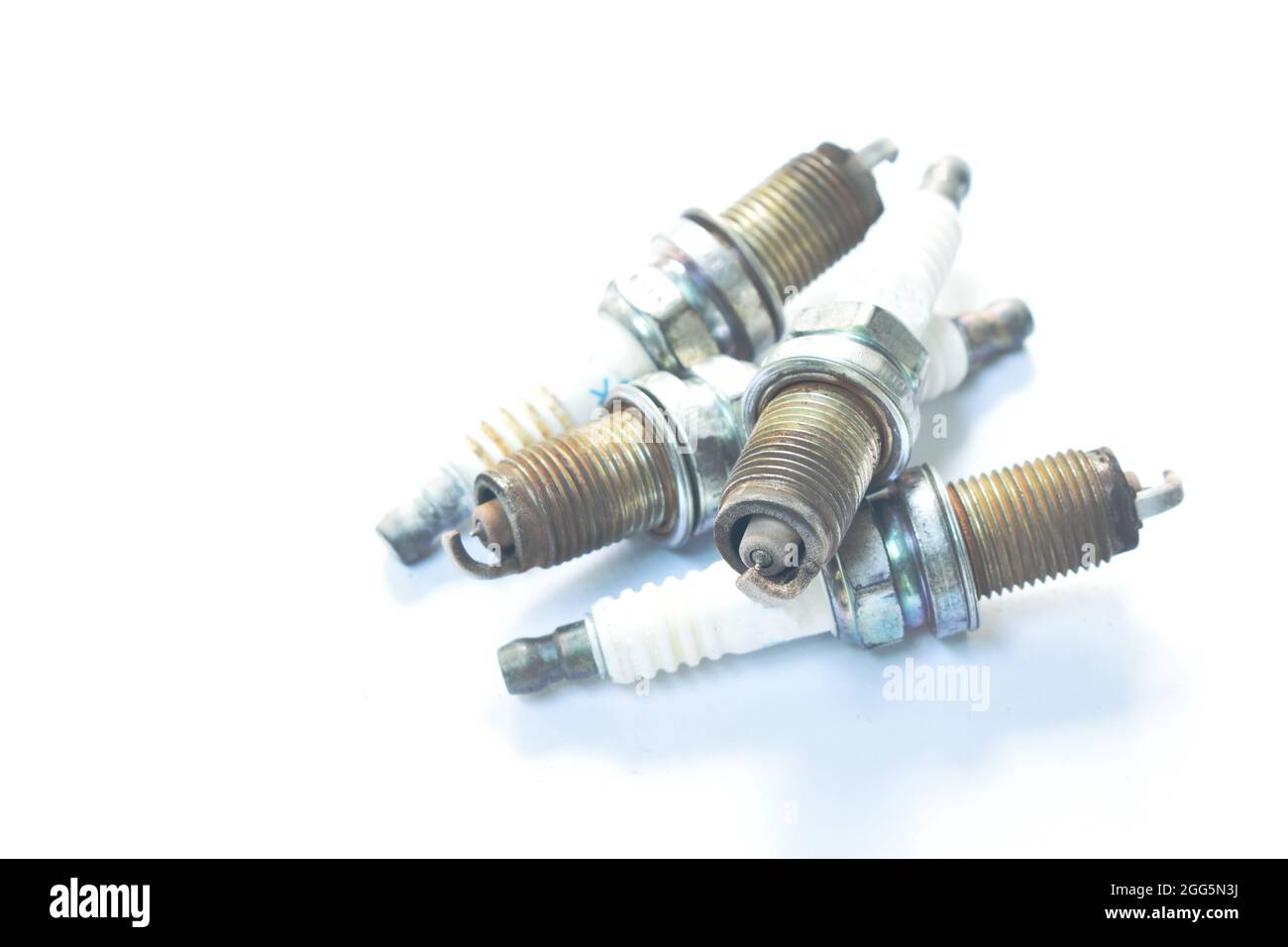 old car spark plug arranging on white background Stock Photo Alamy