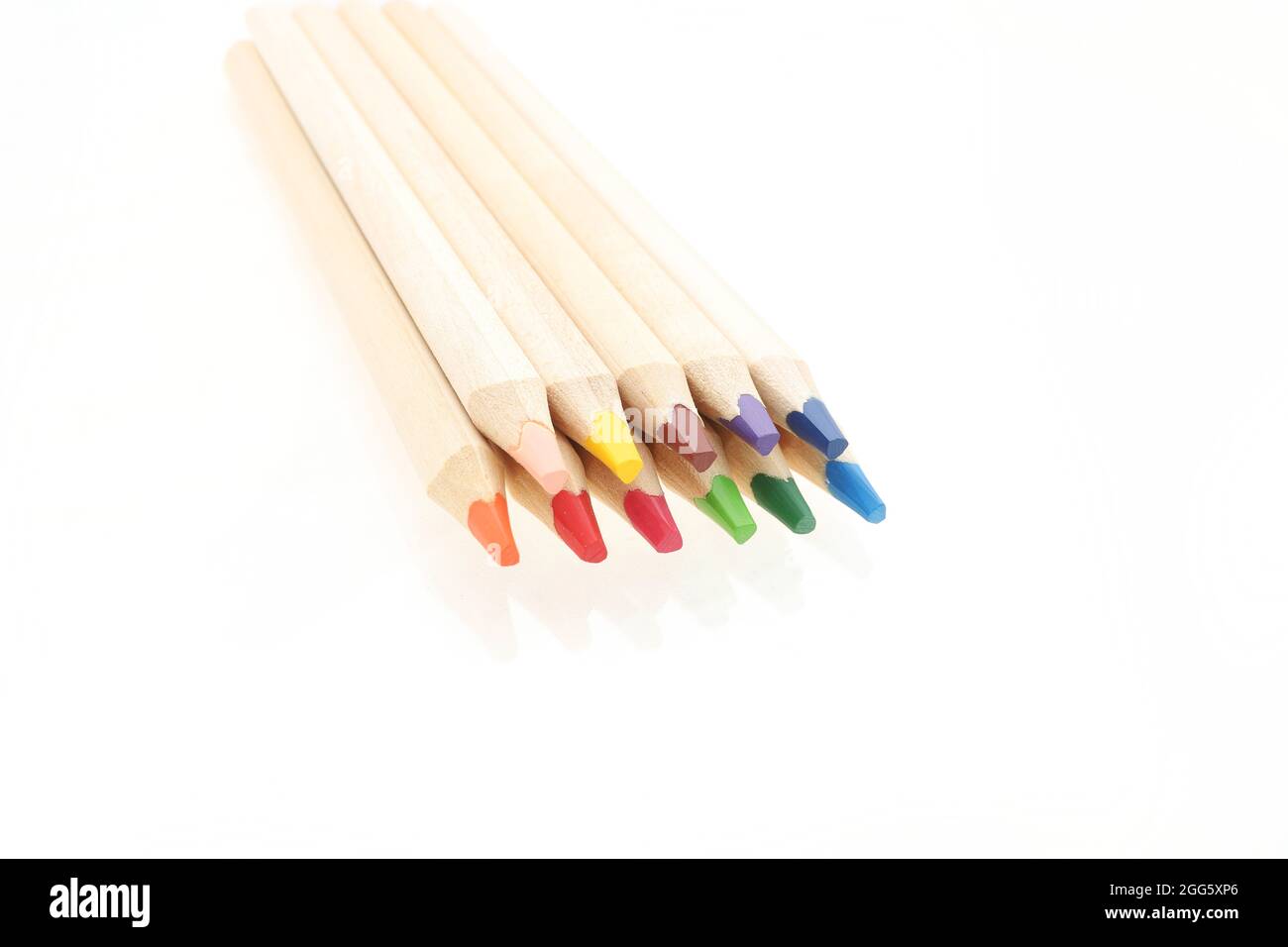 Wooden colorful pencils isolated on white Stock Photo