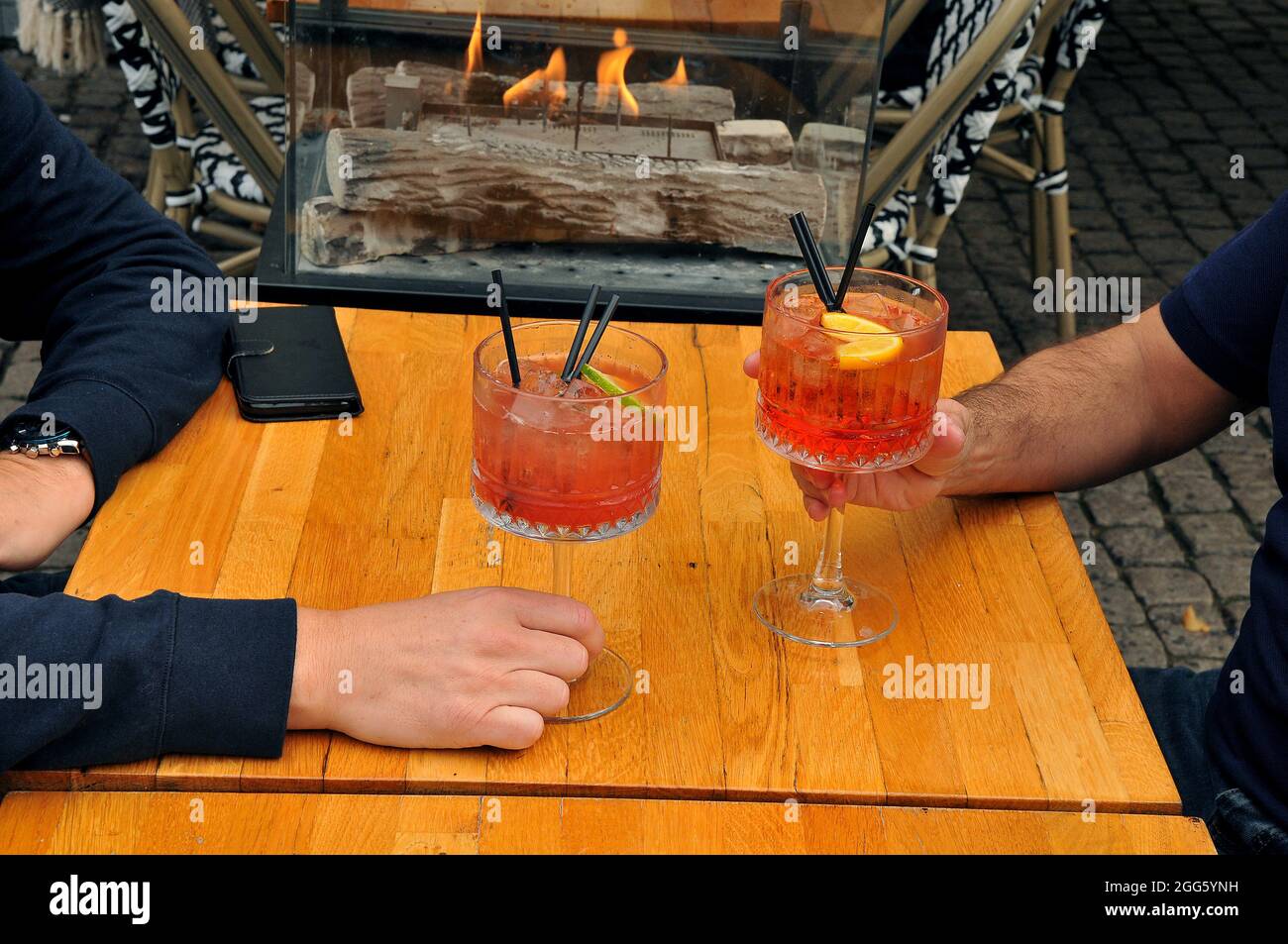 Copenhagen, Denmark., 29 August 2021, /Cafe customers enjoy outdoor
