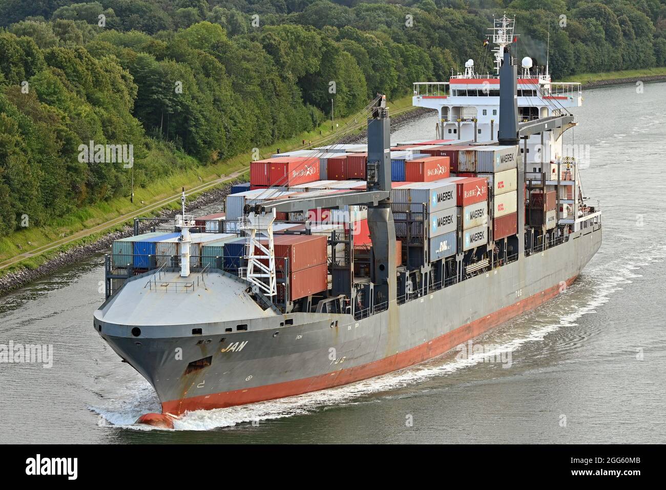 Containership JAN passing the Kiel Canal Stock Photo