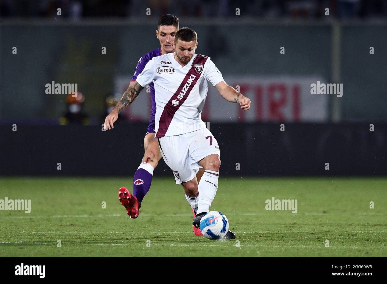 Florence, Italy. 28th Aug, 2021. Karol Linetti (Torino FC) in action  against Nikola Milenkovic (ACF Fiorentina) during ACF Fiorentina vs Torino  FC, Italian football Serie A match in Florence, Italy, August 28