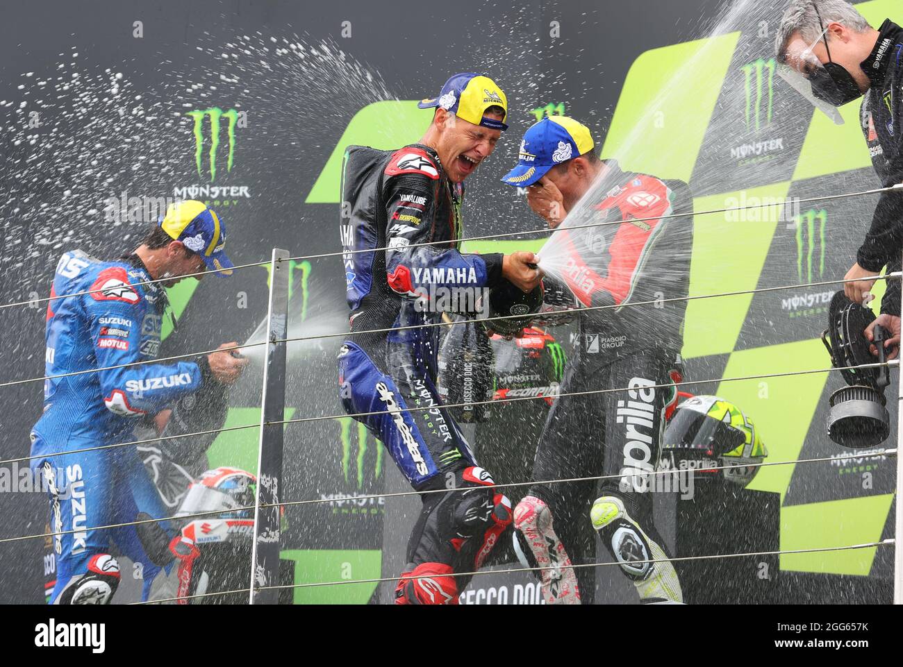 Silverstone, UK. 29th Aug 2021. Fabio Quartararo Monster energy Yamaha MotoGP spraying champagne on podium for MotoGP race during the Monster Energy British Grand Prix MotoGP at Silverstone Circuit, Towcester, England on the 27 to 29 August 2021. Photo by Ian Hopgood. Credit: PRiME Media Images/Alamy Live News Stock Photo