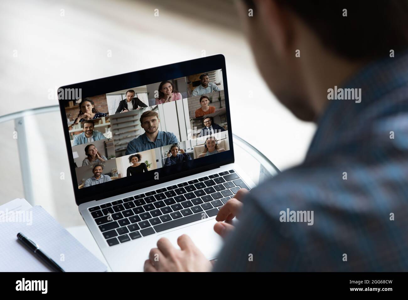 Laptop screen with business group video call head shots Stock Photo