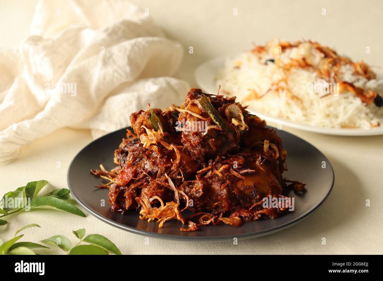 Kerala style spicy chicken roast Served with ghee rice made of basmati