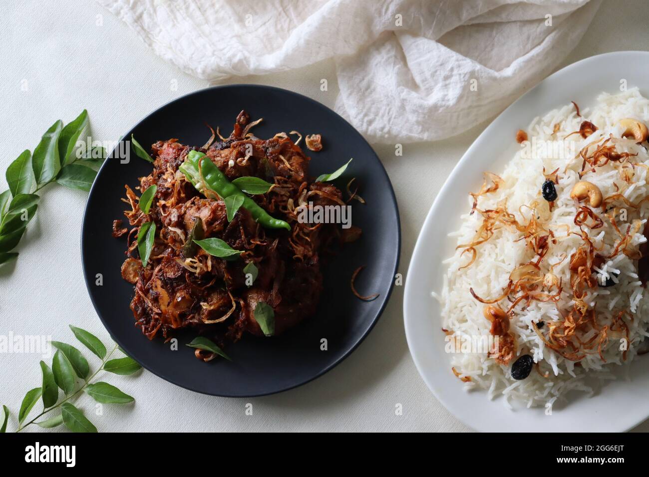 Kerala style spicy chicken roast Served with ghee rice made of basmati