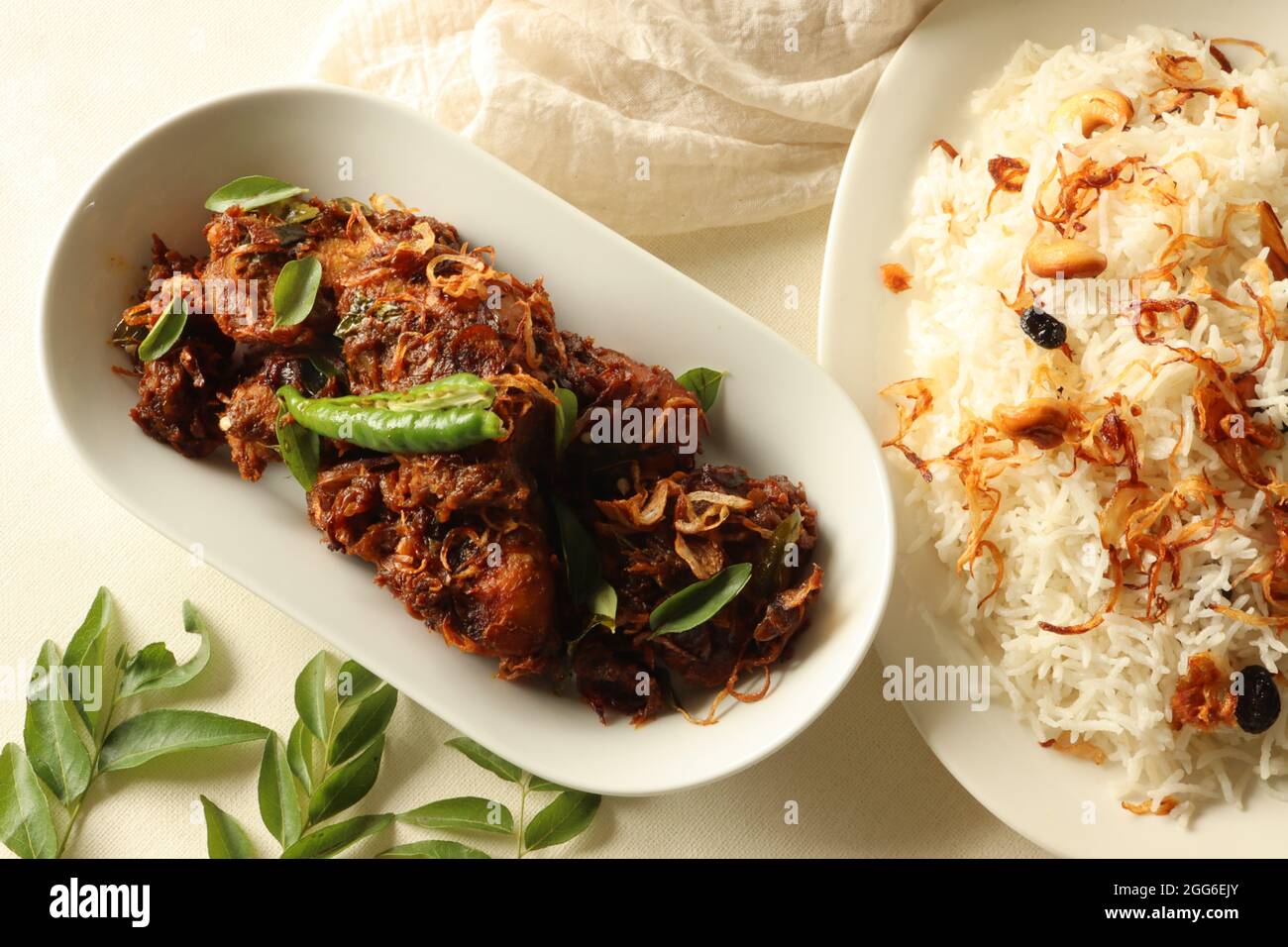 Kerala style spicy chicken roast Served with ghee rice made of basmati