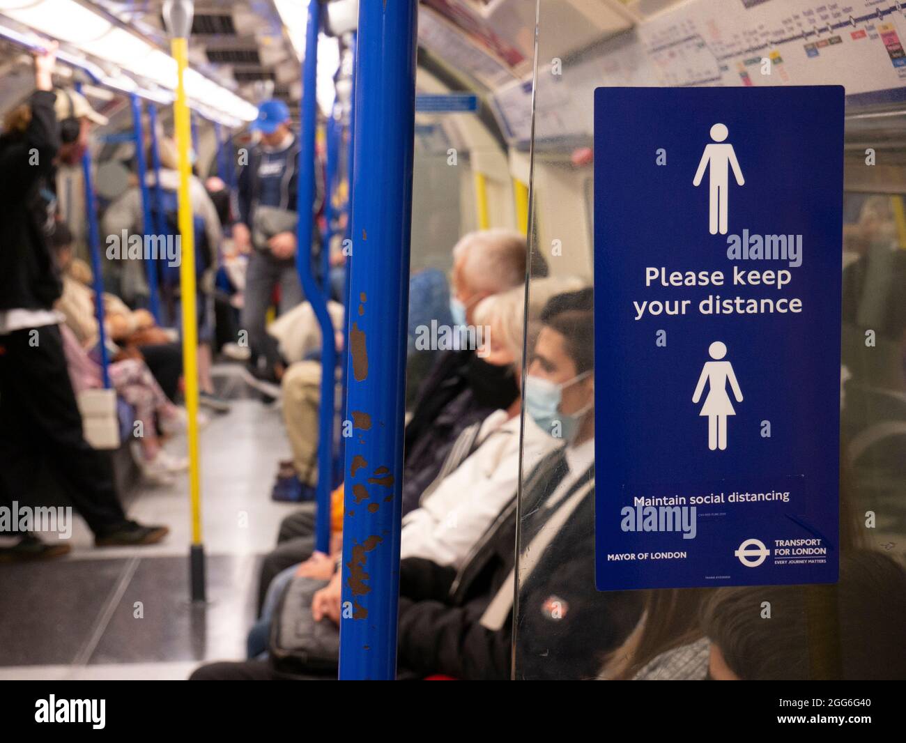 London underground tube train with Please keep your distance sign ...