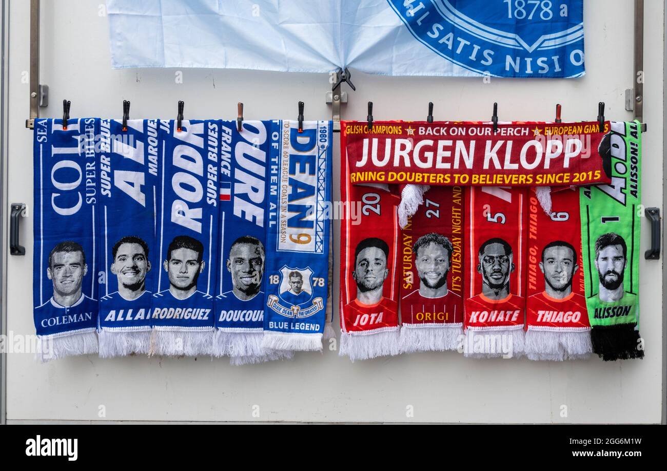 European football banners showing the stars of both Liverpool clubs, Liverpool and Everton, the Reds and the Blues Stock Photo