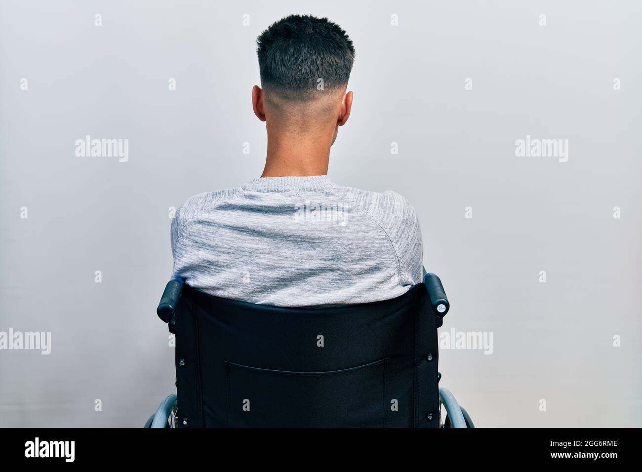 Man sitting backwards chair hires stock photography and images Alamy