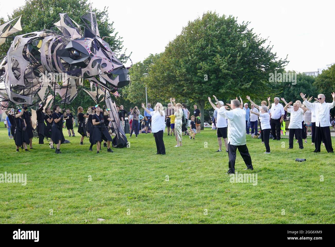 Plymouth, UK. 29th July, 2021. “The Hatchling” a puppet dragon, and