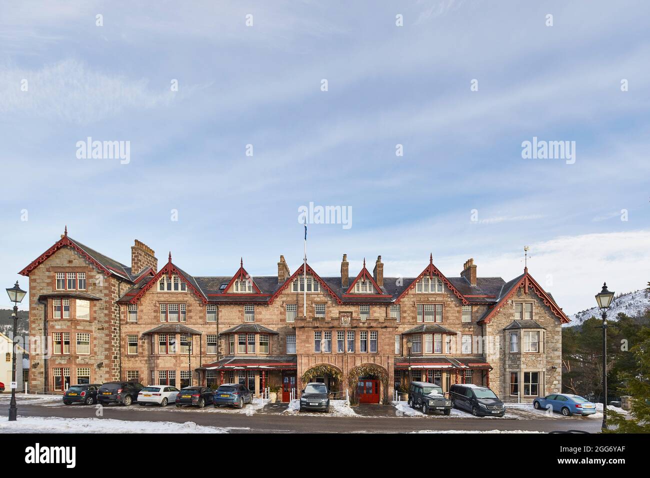 Exterior of building with parking. Fife Arms, Braemar, United Kingdom. Architect: Moxon, 2019. Stock Photo