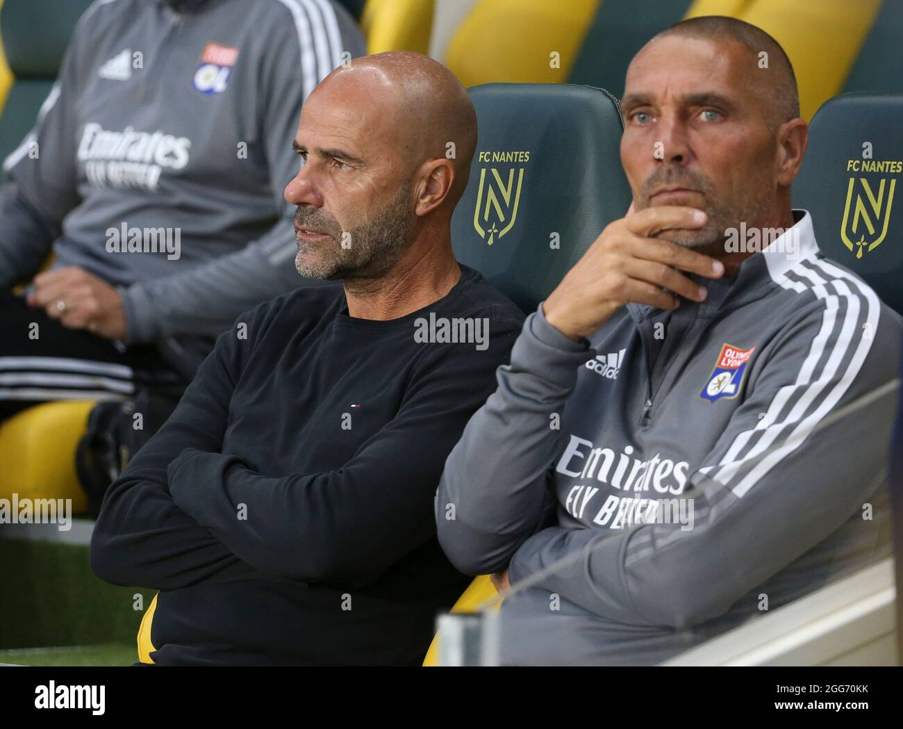 Coach of Olympique Lyonnais Peter Bosz, assistant-coach Hendrie Kruzen  during the French championship Ligue 1 football match between FC Nantes and Olympique  Lyonnais (OL) on August 27, 2021 at Stade de La