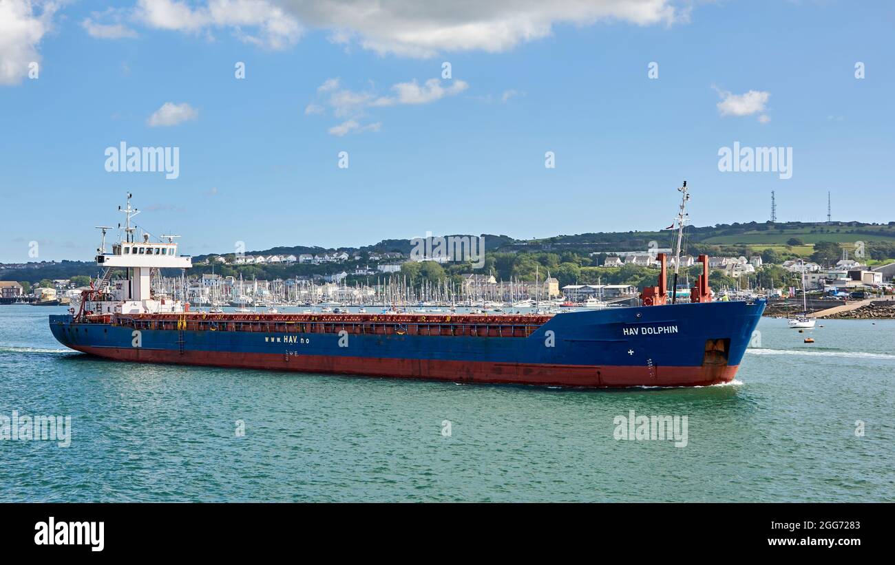 General cargo ship HAV Dolphin leaves port in the Cattewater and heads out to sea through Plymouth Sound Stock Photo