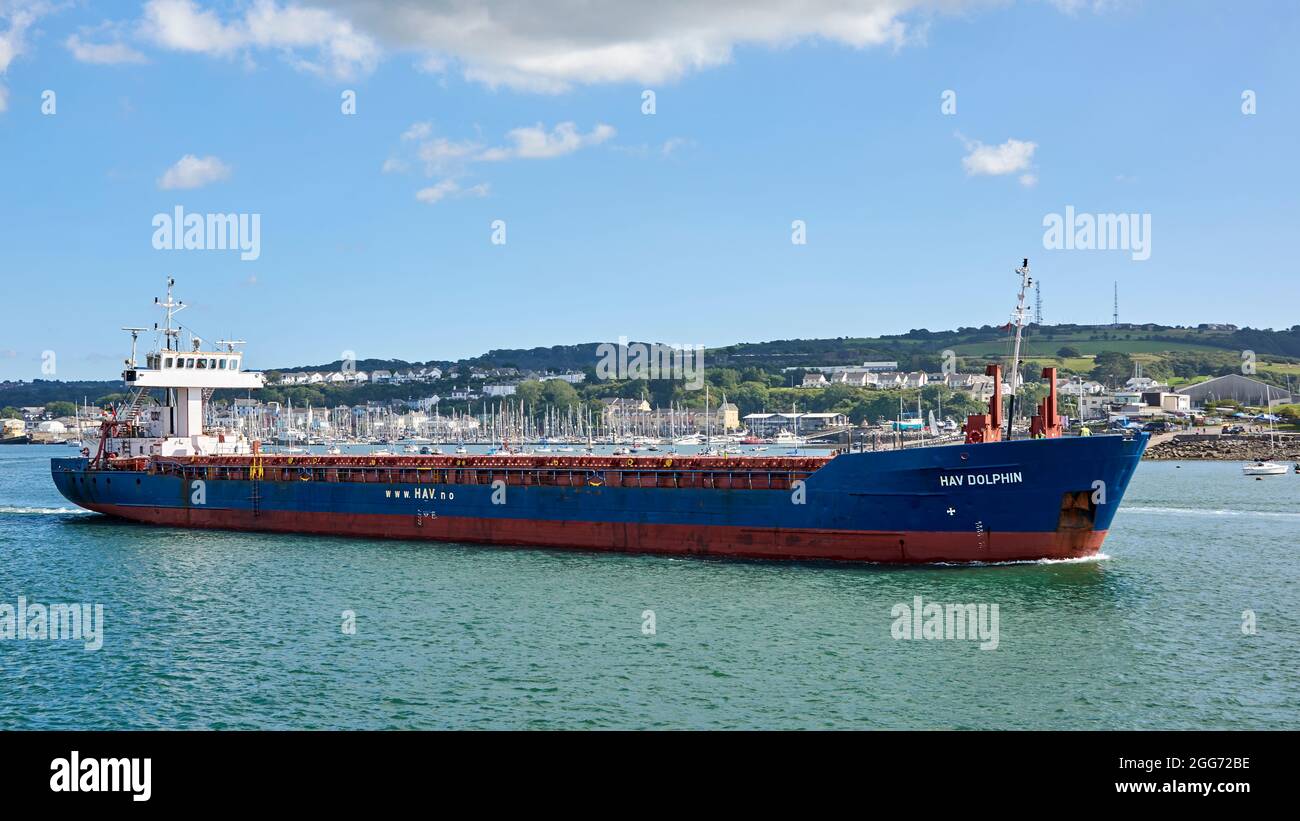 General cargo ship HAV Dolphin leaves port in the Cattewater and heads out to sea through Plymouth Sound Stock Photo