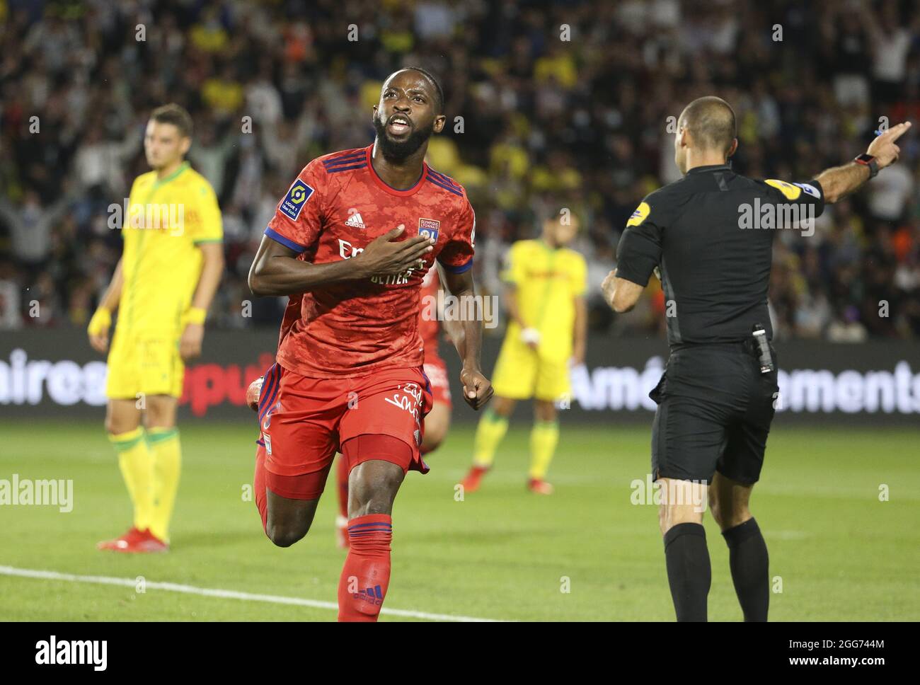 Moussa Dembele of Lyon celebrates his goal during the French championship  Ligue 1 football match between FC Nantes and Olympique Lyonnais (OL) on  August 27, 2021 at Stade de La Beaujoire -