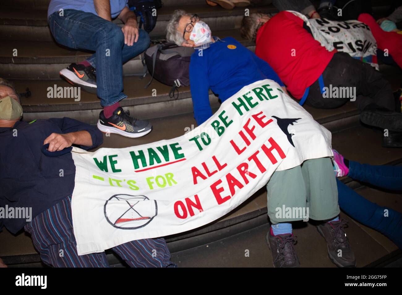 London, England, UK 29th August 2021 Extinction Rebellion activists hold a Science Museum Die-In and D lock themselves to railings in protest at Shells funding of their climate exhibit Credit: Denise Laura Baker/Alamy Live News Stock Photo