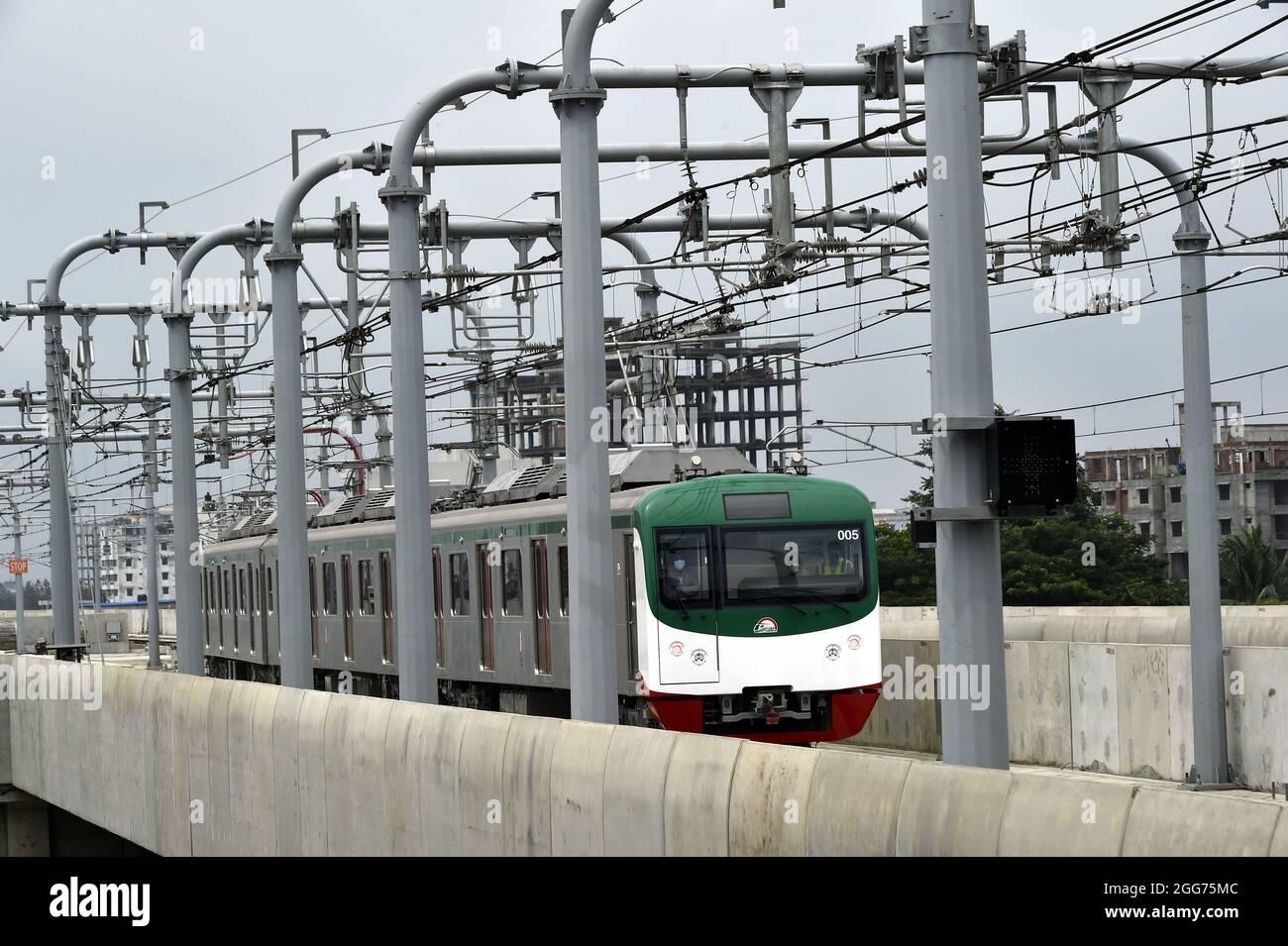 A Pilot In The Metro Station Begin Drives The Electric Metro Rail Train a-pilot-in-the-metro-station-begin-drives-the-electric-metro-rail-train