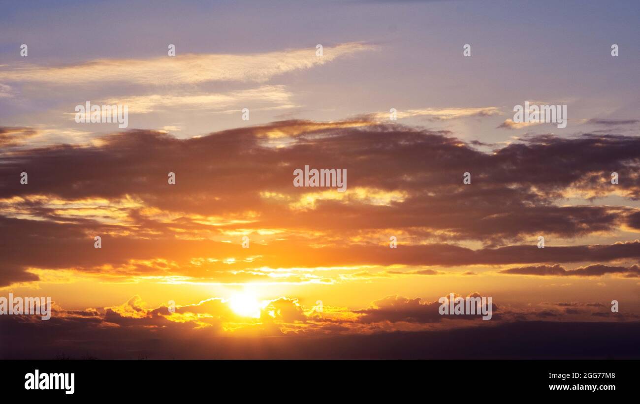 Dramatic sky of a sunrise. Ideal for background use and sky replacement in  photo editing Stock Photo - Alamy