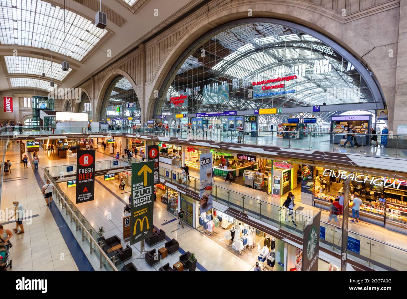 Leipzig, Germany - August 19, 2020: Leipzig main railway station Hauptbahnhof Hbf Deutsche Bahn DB hall with shops in Germany. Stock Photo