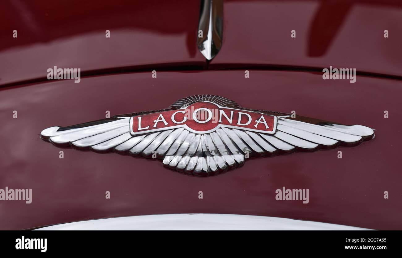 A Lagonda badge on a bonnet at The Stony Stratford Classic Car Festival. Stock Photo