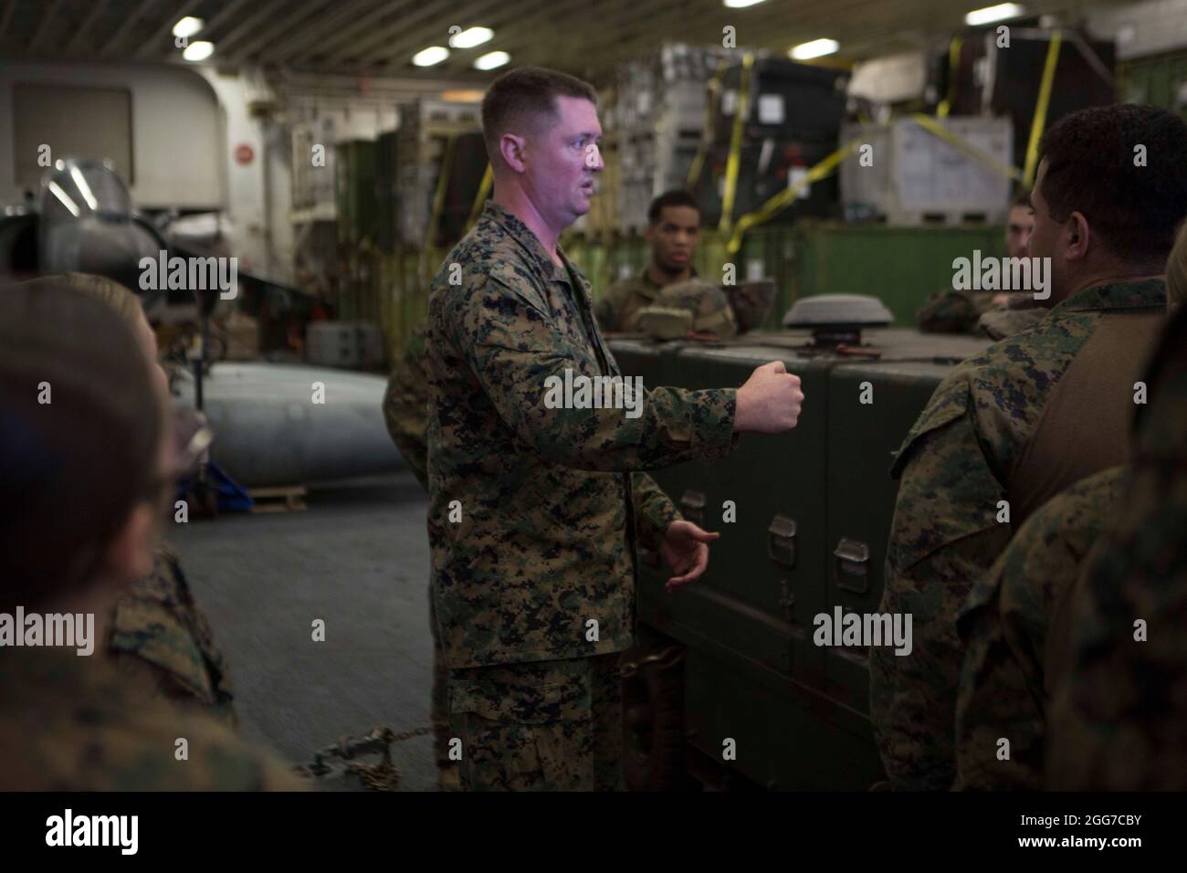 2100405-M-GJ479-005, USS IWO JIMA, Atlantic Ocean, April 5, 2021- U.S. Marine Corps Gunnery Sgt. Christopher McClane the communications chief for Combat Logistics Battalion 24, 24th Marine Expeditionary Unit (MEU), conducts a brief before an en route care exercise aboard the Wasp-class amphibious assault ship USS Iwo Jima (LHD 7), April 5, 2021. 24th MEU, embarked with the Iwo Jima Amphibious Ready Group, is forward deployed in the U.S. Sixth Fleet area of operations in support of U.S. national security interests in Europe and Africa. (U.S. Marine Corps photo by Staff Sergeant Mark E Morrow Jr Stock Photo