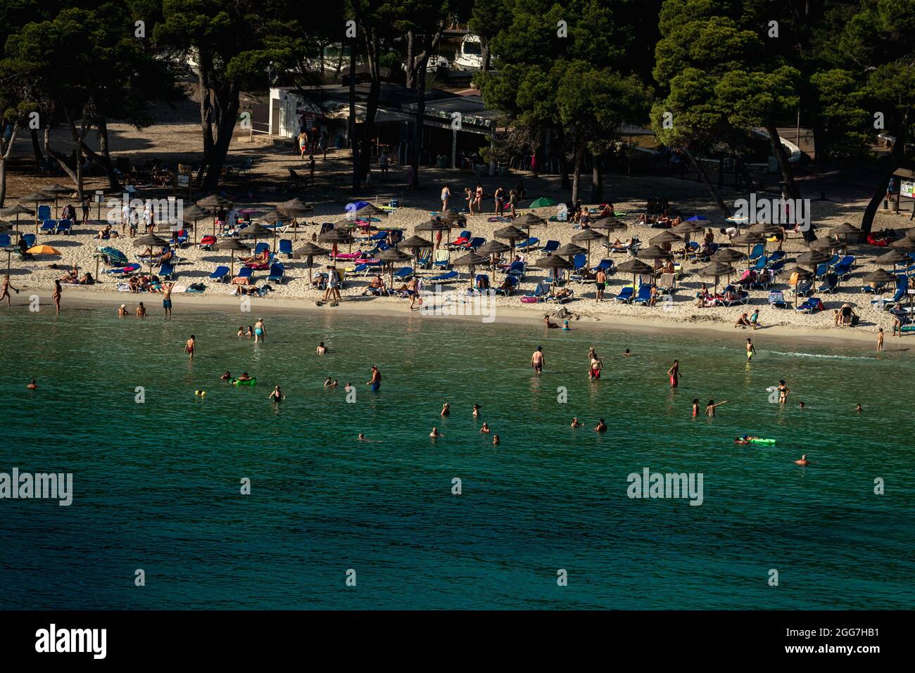 Cala Galdana, Menorca, Spain. 29th Aug, 2021. Beachgoers enjoy the  Mediterranean sea at the sunny Cala Galdana beach at Menorca's south coast  while Spain experiences an 'operation return' similar in numbers to