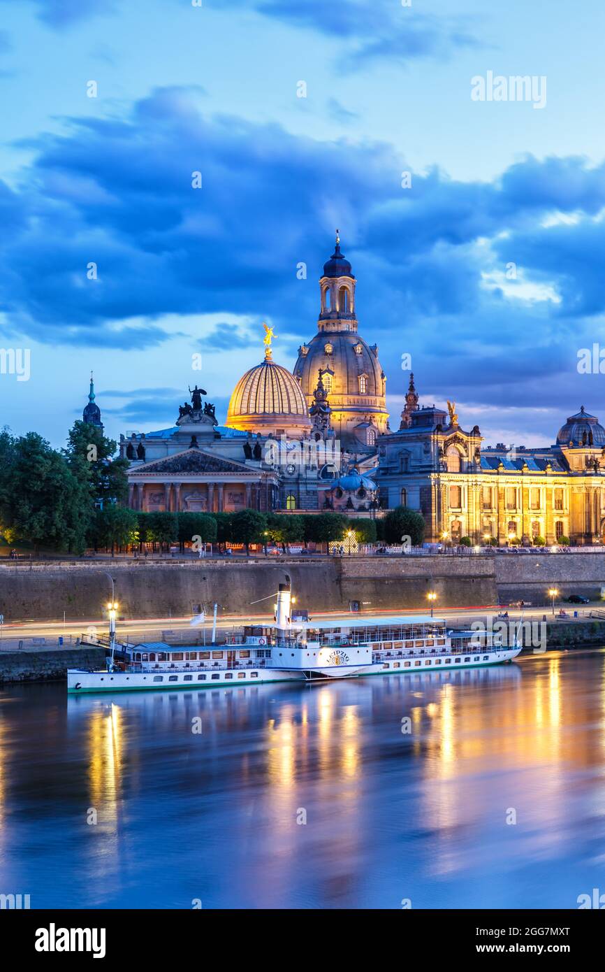 Dresden Frauenkirche church skyline Elbe old town panorama in Germany at night portrait format twilight Stock Photo