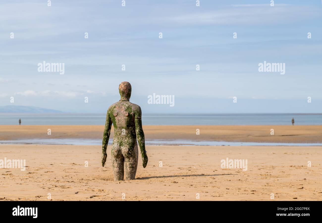 Beach iron man hi-res stock photography and images - Alamy