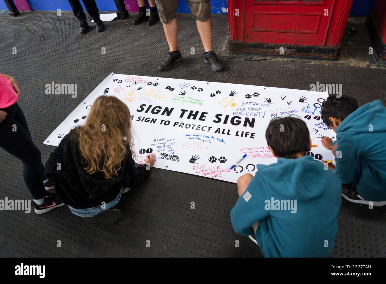 National Animal Rights March, organised by Animal Rebellion and  Extinction Rebellion in the City of London, England, UK. Several thousand people joined the group that campaigns to transition our food system to plant-based system in order to tackle the climate emergency.  August 28 2021 Stock Photo
