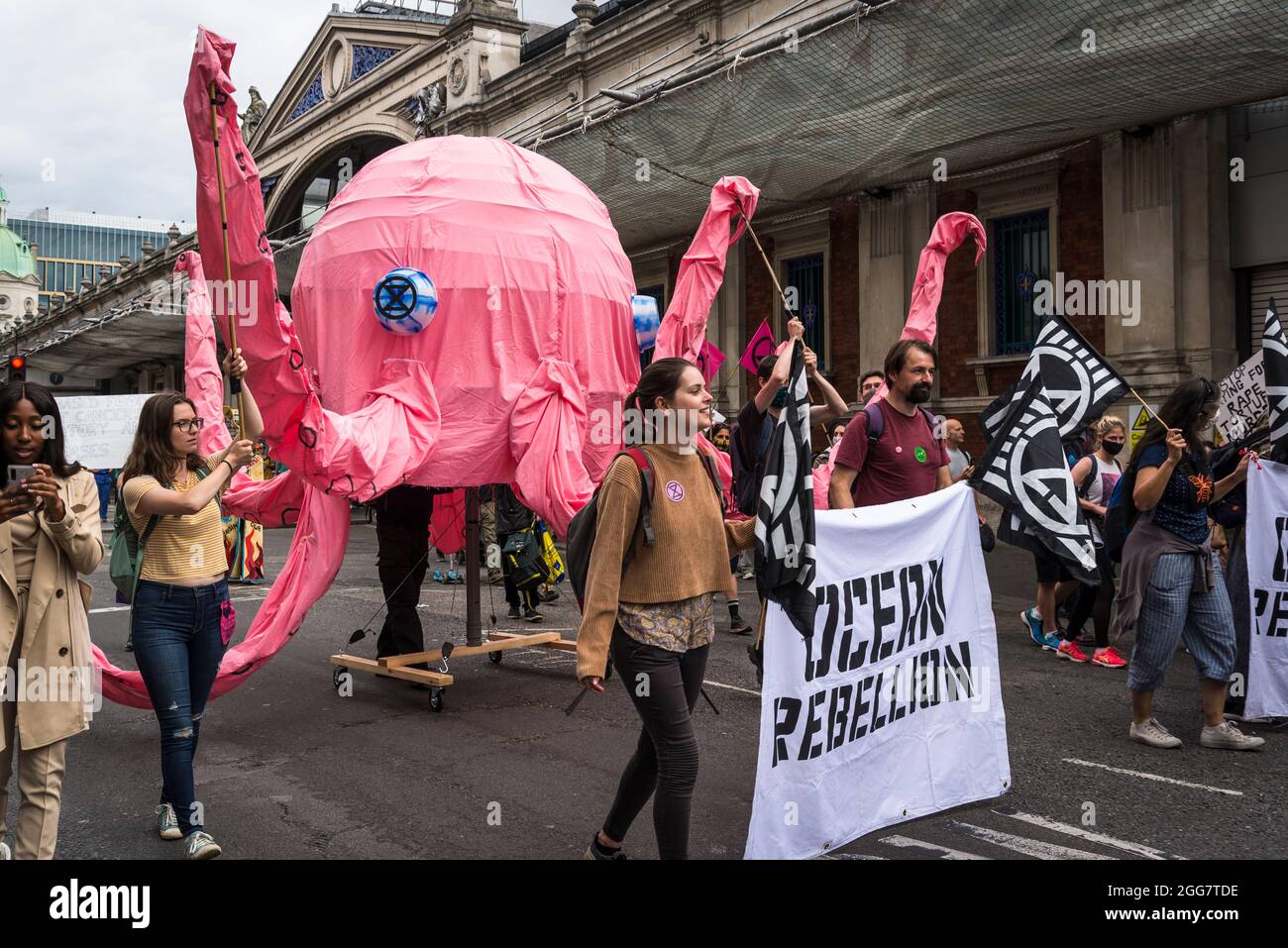 Ocean Rebellion, National Animal Rights March, organised by Animal Rebellion and  Extinction Rebellion in the City of London, England, UK. Several thousand people joined the group that campaigns to transition our food system to plant-based system in order to tackle the climate emergency.  August 28 2021 Stock Photo