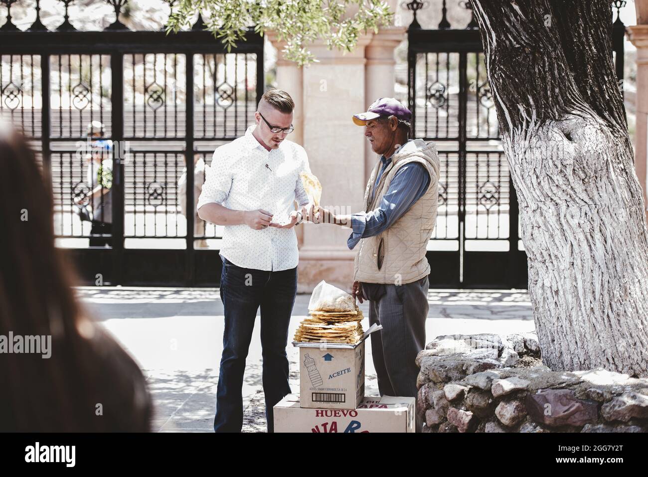 ZACATECAS, MEXICO - Apr 01, 2018: A male Hispanic street vendor selling