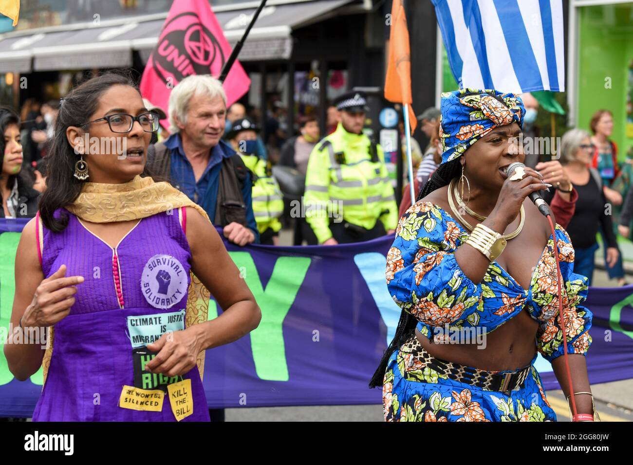 London, UK. 29th Aug, 2021. Activist and environmentalist Marvina Newton leads the march at Extinction Rebellion's Carnival for Climate Justice in London part of their two weeks of Impossible Rebellion protests.XR Unify is a BIPOC-led (black, Indigenous and people of colour) group who are taking action to put a stop to the fossil fuel industry. Credit: SOPA Images Limited/Alamy Live News Stock Photo