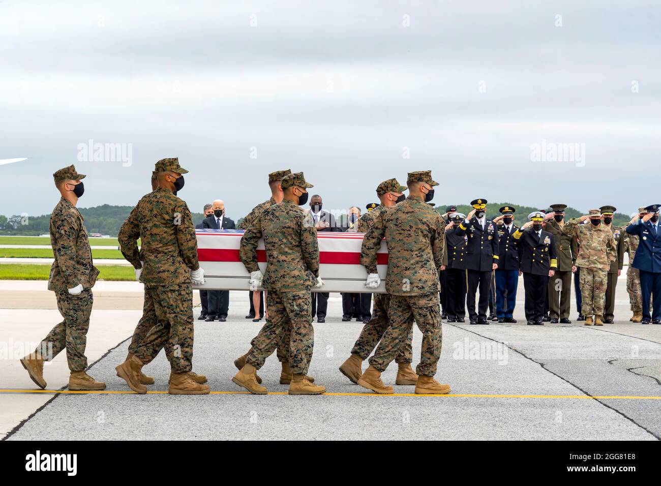 A U.S. Marine Corps carry team transfers the remains of Marine Corps