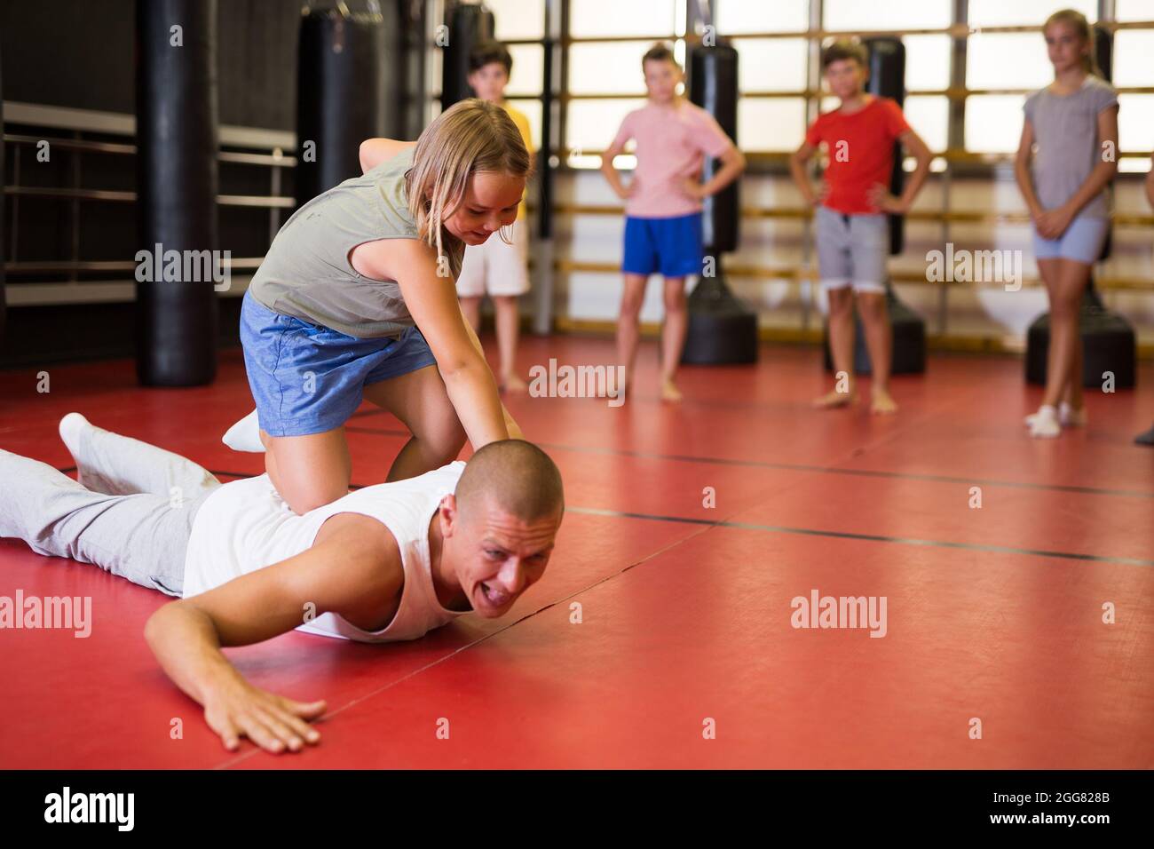 Young Schoolgirl Practicing Basic Self Defense Moves Stock Photo Alamy