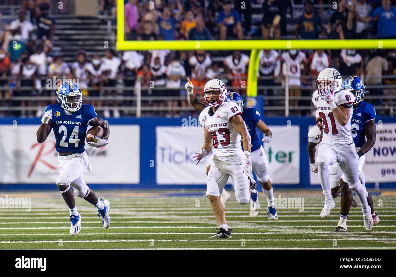 August 28 2021 San Jose, CA USA San Jose State safety Norio Thomas (24) tries to run away from Southern Utah Thunderbirds wide receiver Ethan Bolingbroke (83) and Southern Utah Thunderbirds wide receiver Brennon Hutchings (81) during the NCAA Football game between Southern Utah Thunderbirds and the San Jose State Spartans. San Jose State won 45-14 at CEFCU Stadium San Jose, CA. Thurman James/CSM Stock Photo