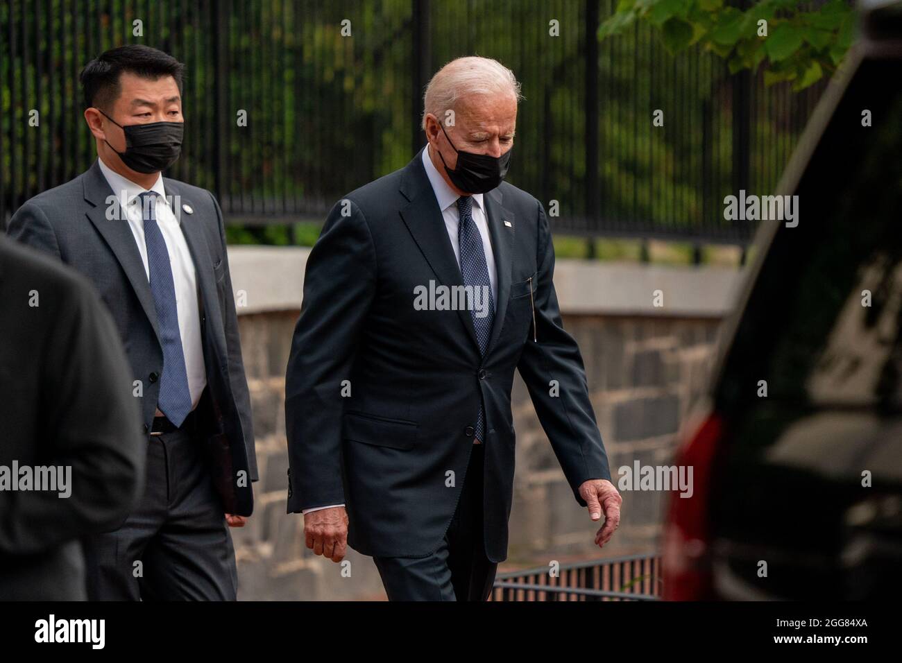 Washington, United States. 29th Aug, 2021. US President Joe Biden walks out of Holy Trinity Catholic Church after mass in the Georgetown neighborhood of Washington, DC on Sunday, August 29, 2021. President Biden earlier attended a dignified transfer in Dover, Delaware for 13 members of the US military who were killed in Afghanistan last week and gave an update on Hurricane Ida from FEMA headquarters. Photo by Ken Cedeno/UPI Credit: UPI/Alamy Live News Stock Photo
