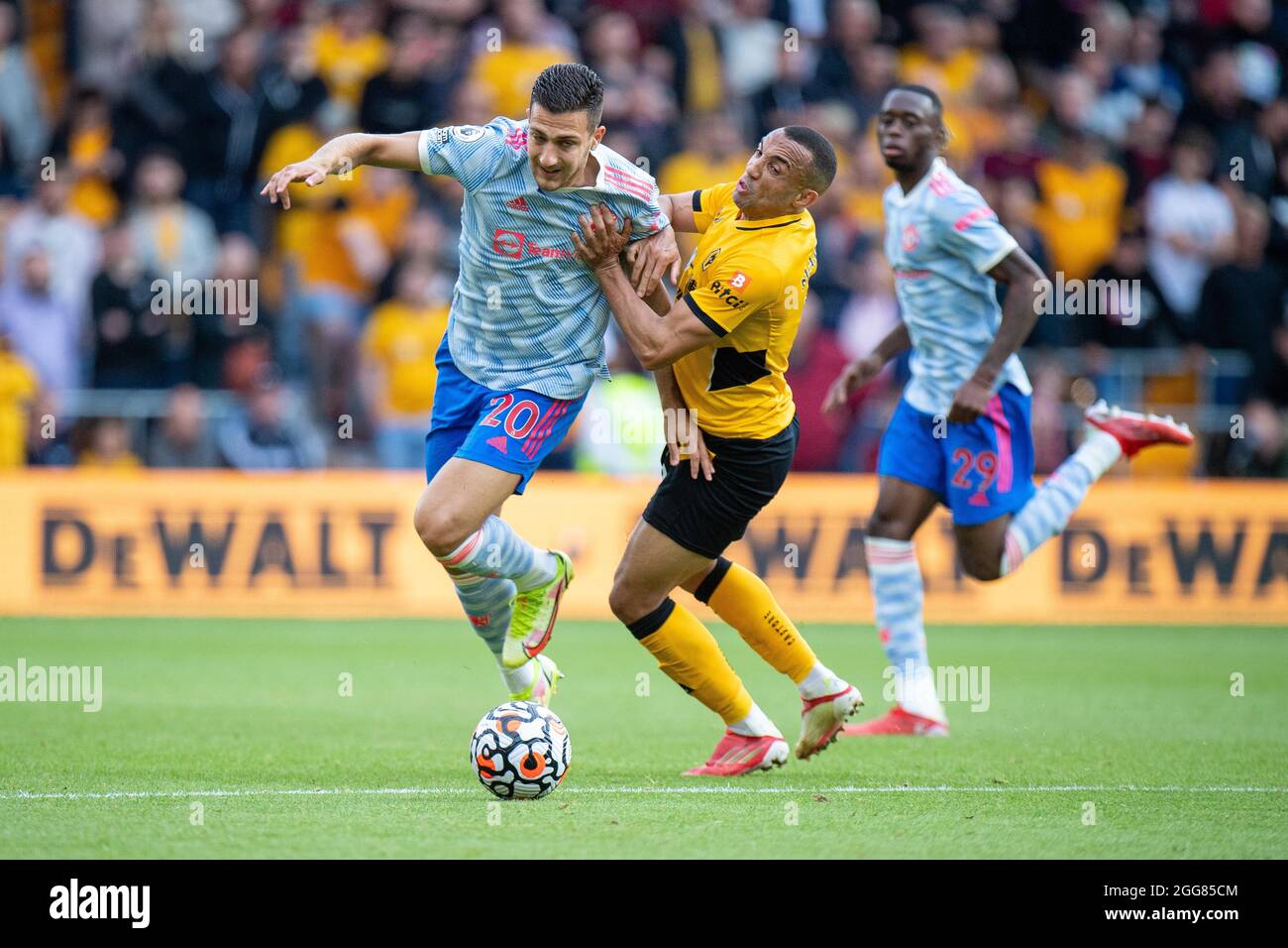 WOLVERHAMPTON, ENGLAND - AUGUST 29: Diogo Dolot of Manchester United and Marcal of Wolverhampton Wanderers in action during the Premier League match b Stock Photo