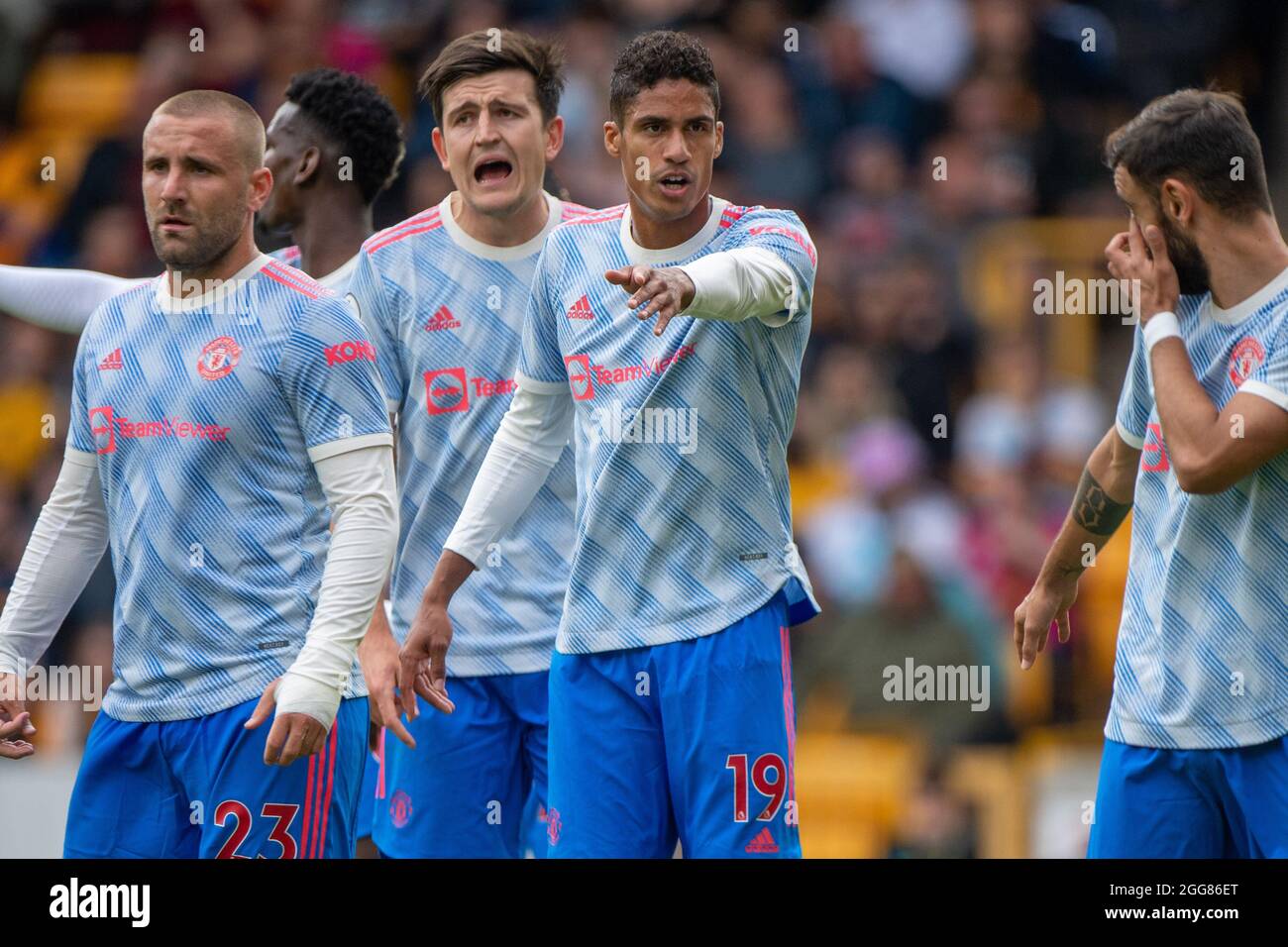 Wolverhampton England August 29 Raphael Varane Harry Maguire Luke Shaw Of Manchester United During The Premier League Match Between Wolverhampto Stock Photo Alamy