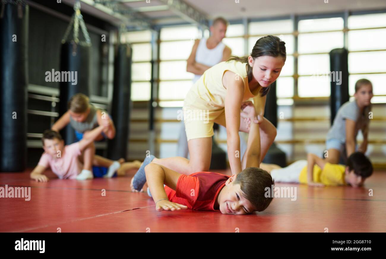 Boy and girl in pair exercising selfdefense movements Stock Photo Alamy