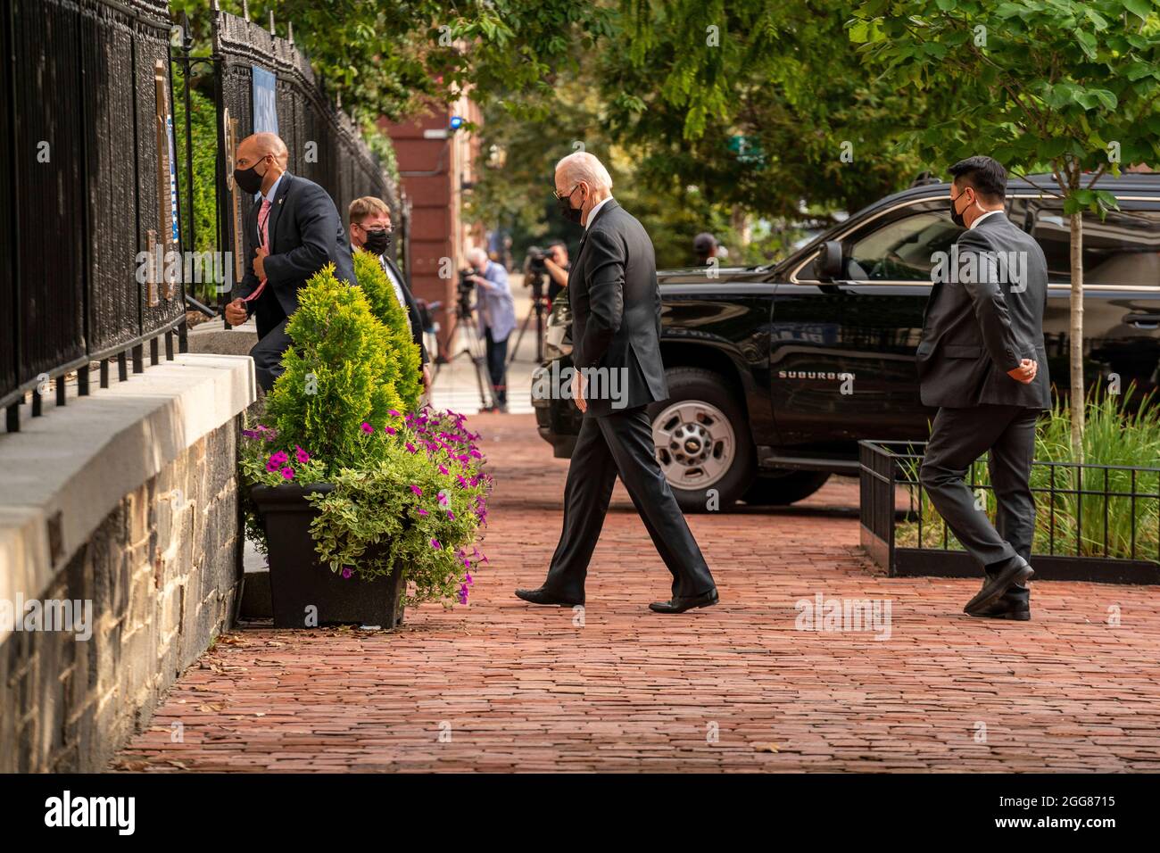 United States President Joe Biden walks into Holy Trinity Catholic Church for mass in the Georgetown neighborhood of Washington, DC, Sunday, August 29, 2021. President Biden earlier attended a dignified transfer in Dover, Delaware for 13 members of the US military who were killed in Afghanistan last week and gave an update on Hurricane Ida from FEMA headquarters. Credit: Ken Cedeno/Pool via CNP Stock Photo
