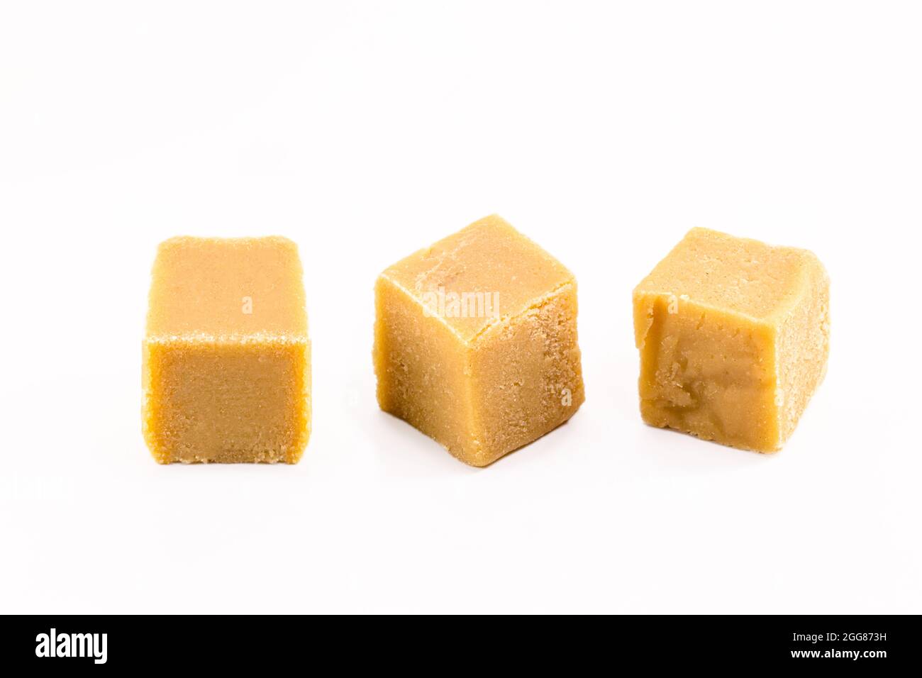 Homemade milk sweet cubes made in Brazil with condensed milk, isolated ...