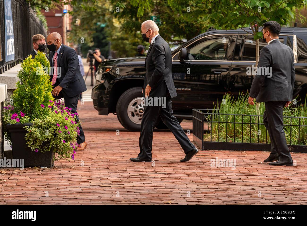 United States President Joe Biden walks into Holy Trinity Catholic Church for mass in the Georgetown neighborhood of Washington, DC, Sunday, August 29, 2021. President Biden earlier attended a dignified transfer in Dover, Delaware for 13 members of the US military who were killed in Afghanistan last week and gave an update on Hurricane Ida from FEMA headquarters. Credit: Ken Cedeno/Pool via CNP /MediaPunch Stock Photo