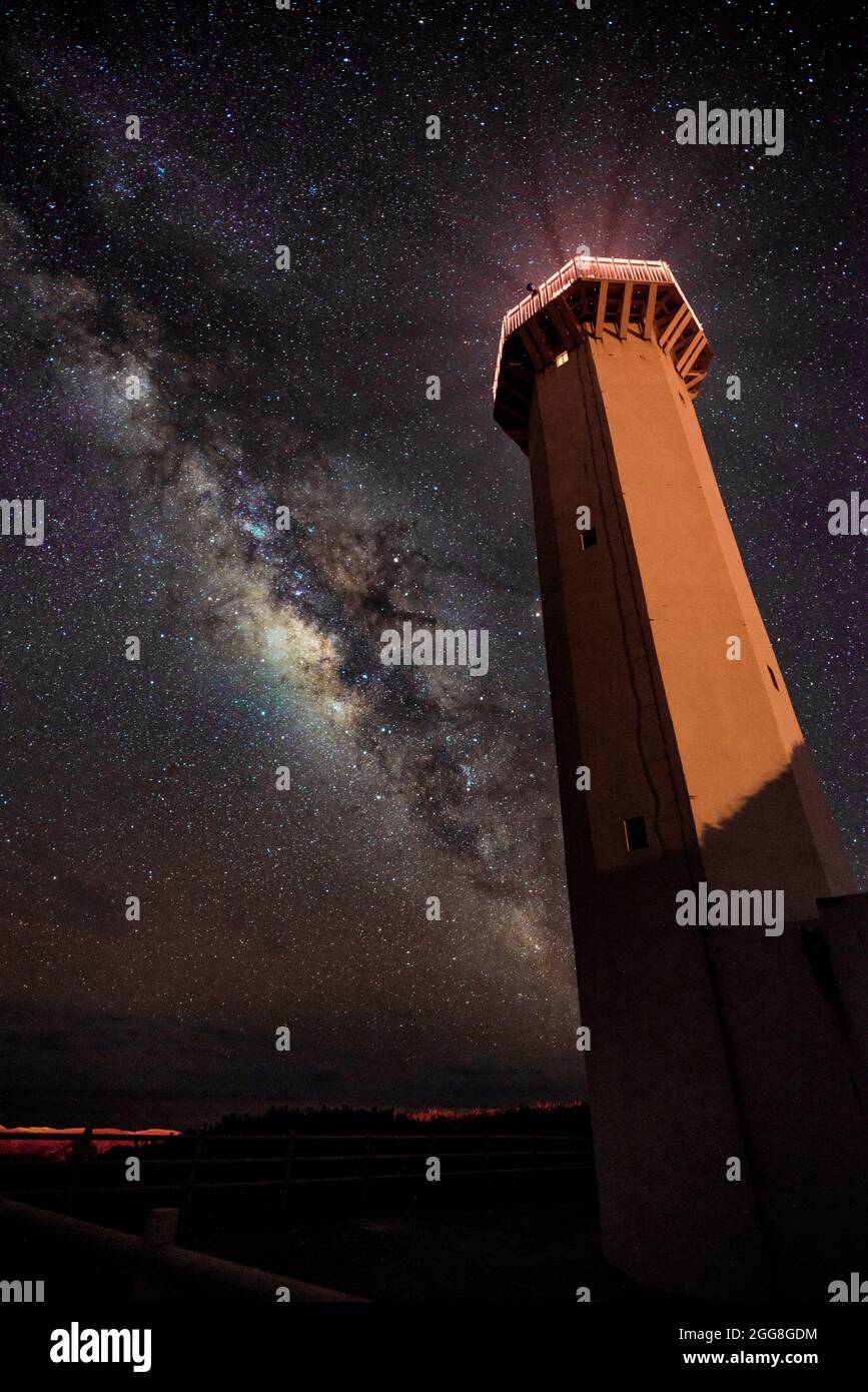 Milky Way above the lighthouse Stock Photo